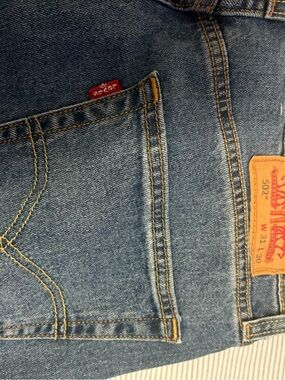 Levi's 502 Taper Men's Jeans in Medium Blue Denim